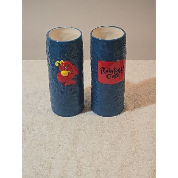 Set Of 2 Rainforest Cafe Tall Red Parrot Blue Ceramic Glasses Cups 7 1/2” Tall - Picture 1 of 7